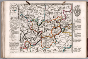 Offenes Buch mit einer detaillierten Deutschlandkarte mit geografischen Merkmalen wie Flüssen, Bergen und Städten, begleitet von beschreibendem Text.