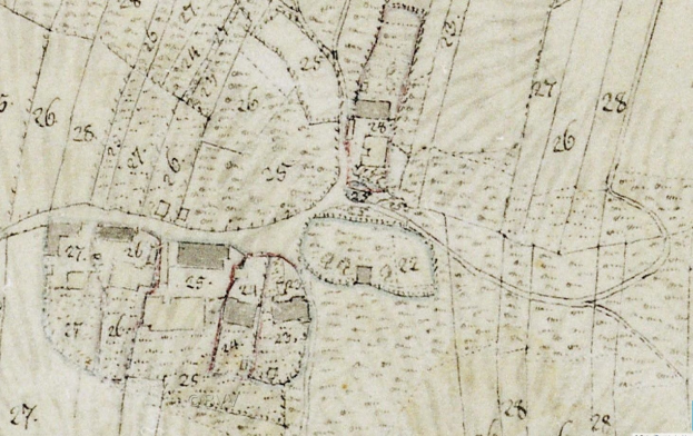 Detailierter alter Stadtplan mit nummerierten Gebäuden, Straßen und Text, der eine vorgeschlagene Entwicklungsfläche am unteren Rand zeigt.