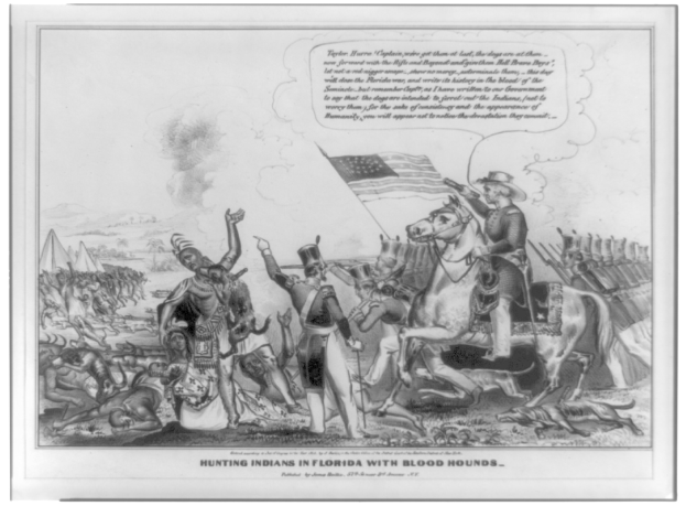 Schwarzes und weißes Foto einer Gruppe von Menschen, einige zu Pferde, mit einer Fahne im Hintergrund und Text unten mit der Aufschrift "Jagen von Indianern in Florida mit Bluthunden".