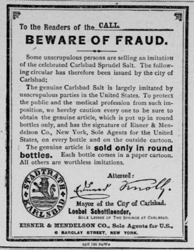 Ein schwarzes und weißes Poster mit einer Betrugswarnung, das den Text 'Carlsbad Spruud Salt' und ein Firmenlogo zeigt.
